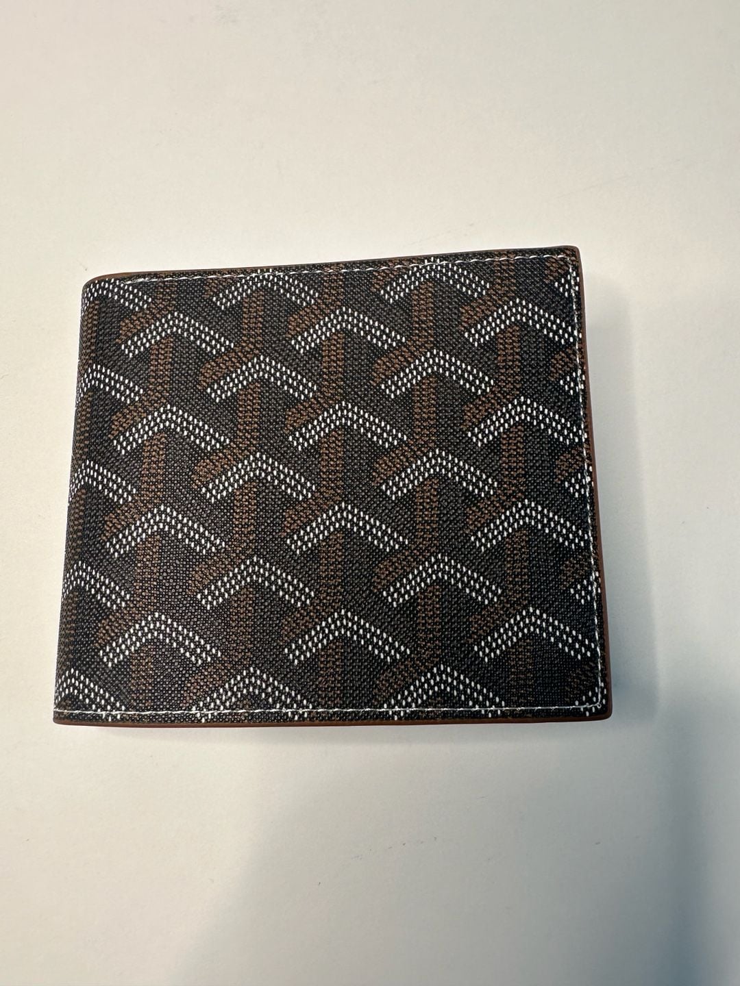 The Black Goyard Victoire Wallet Is A Sleek And...